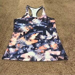 Purple, Pink/Orange/Salmon, White, and Black Galaxy Patterned Actra Tank Top